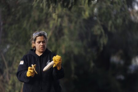 Holding a finished tool at a KINnected Camp, 2024