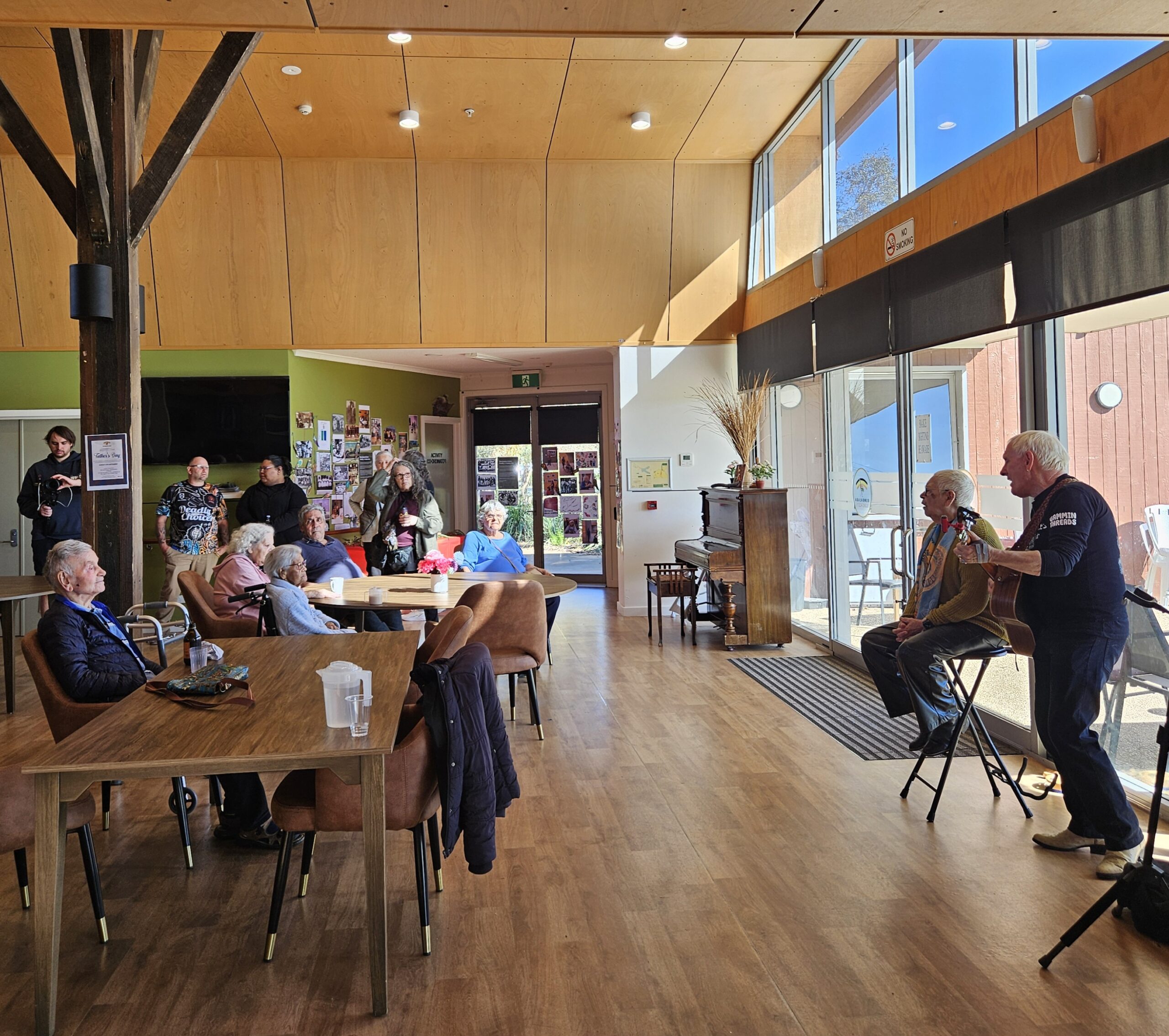 The Muirs performing country songs for Elders and community members
