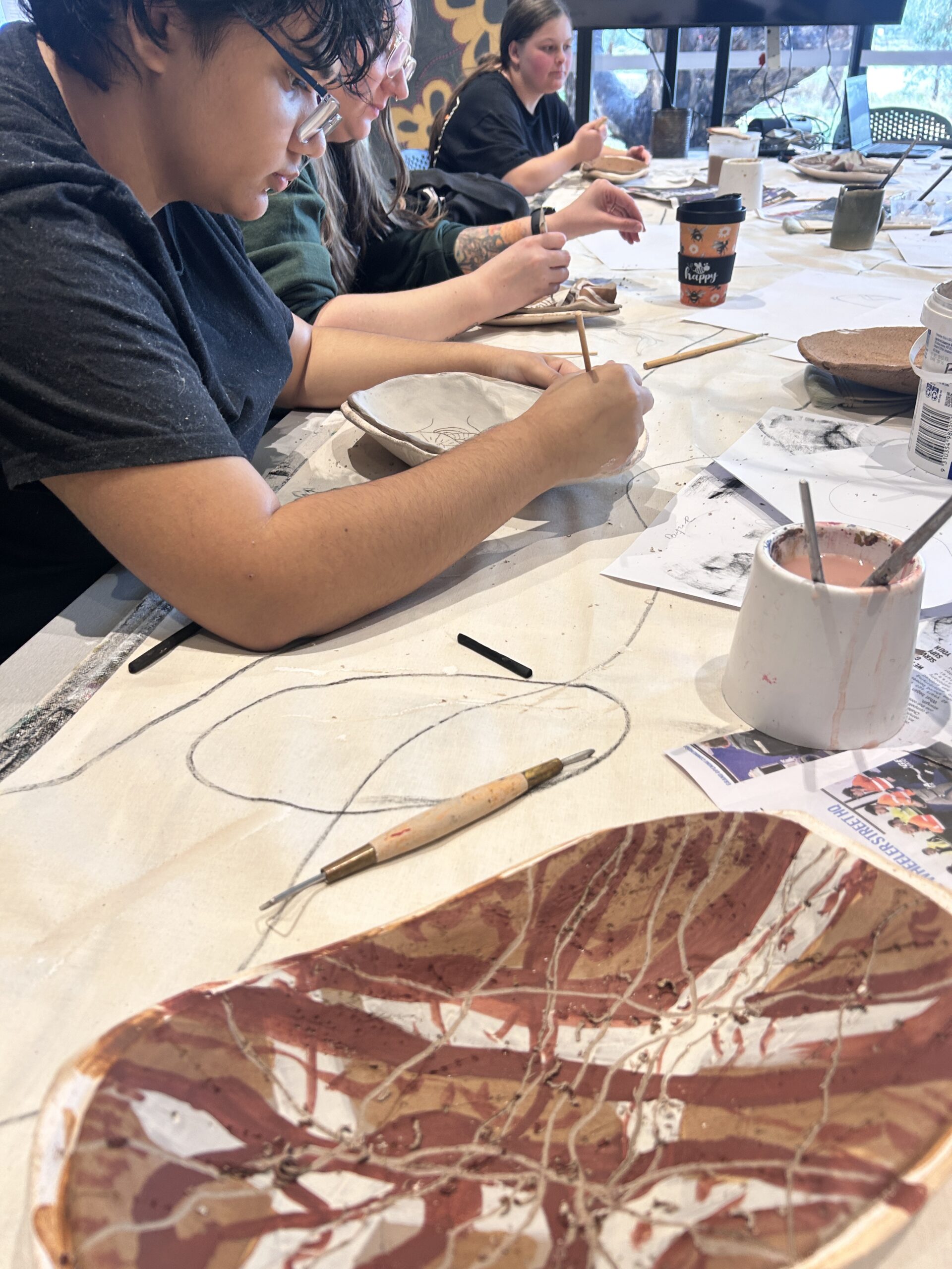 Yalilikarri, Keely and Tiarna from Shepparton Flexible Learning Centre creating ceramic works